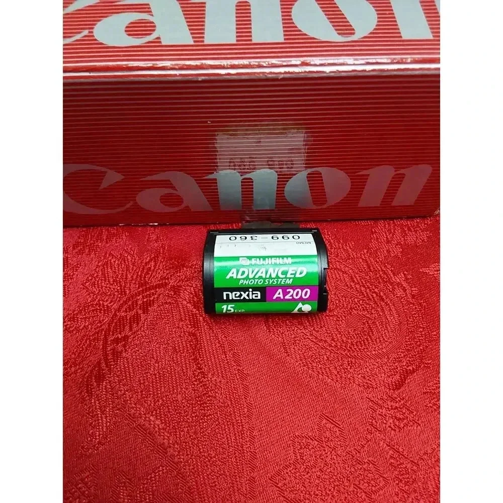 Camera by Canon model lX240 ELPH JR. Includes soft case working Film Camera